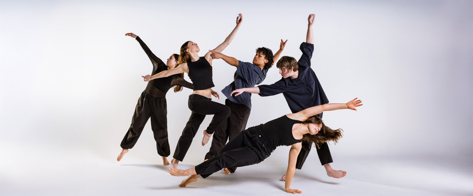 Group of 5 Unitec students hold a contemporary pose