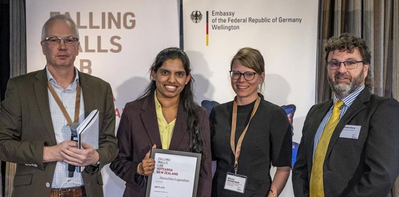 Master of Applied Technologies (Computing) student Manochitra Loganathan accepts her awards form the Falling Walls Lab Aotearoa judges