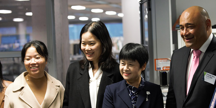 Peseta Sam from Unitec poses with 3 delegates from China Education Association for International Exchange