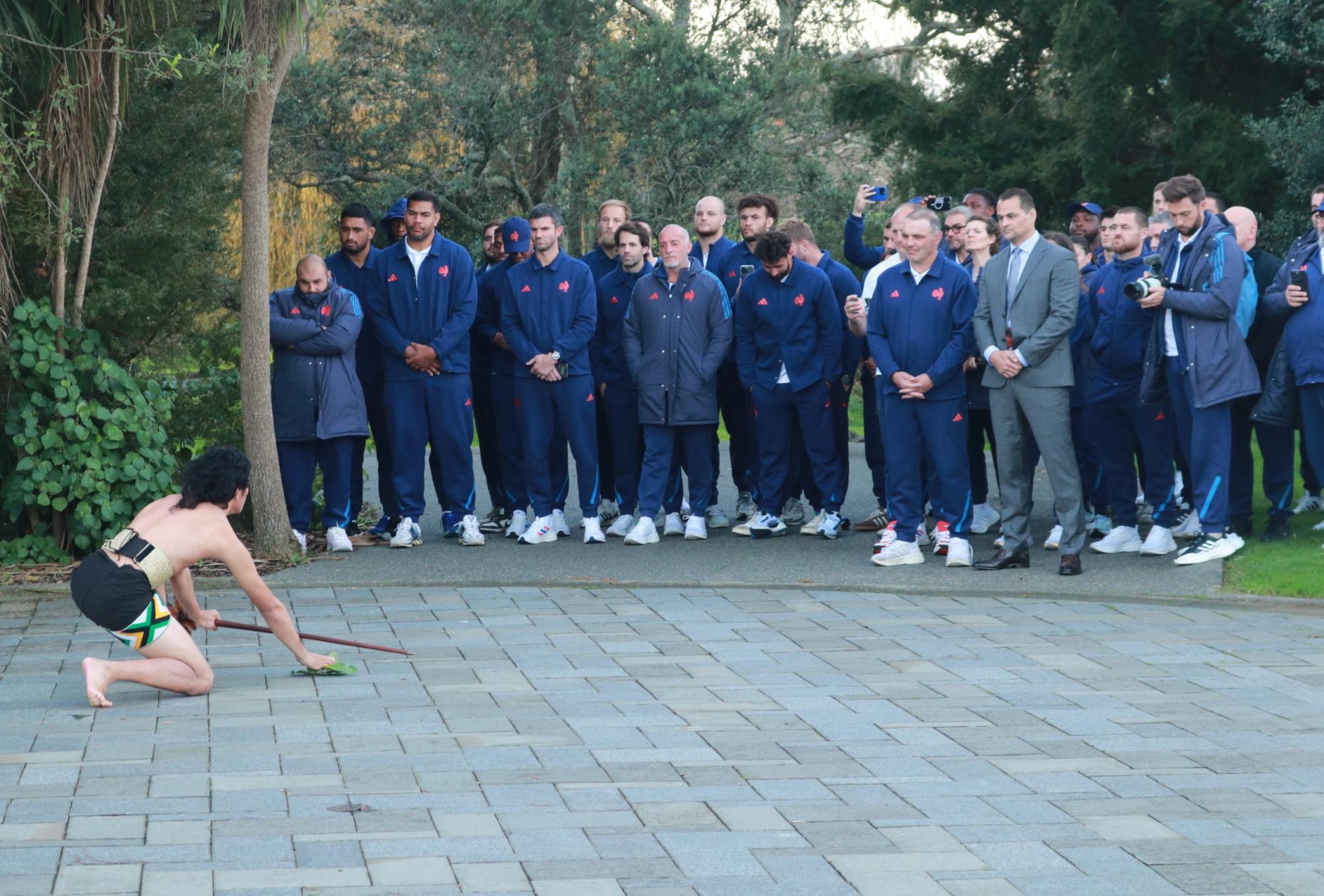 French rugby team watch wero during pōwhiri at Te Noho Kotahitanga marae