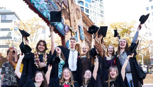 Unitec graduates cheering at Autumn graduation