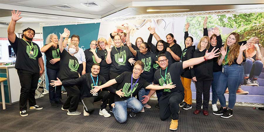 The team of volunteers at open day pose for the camera.
