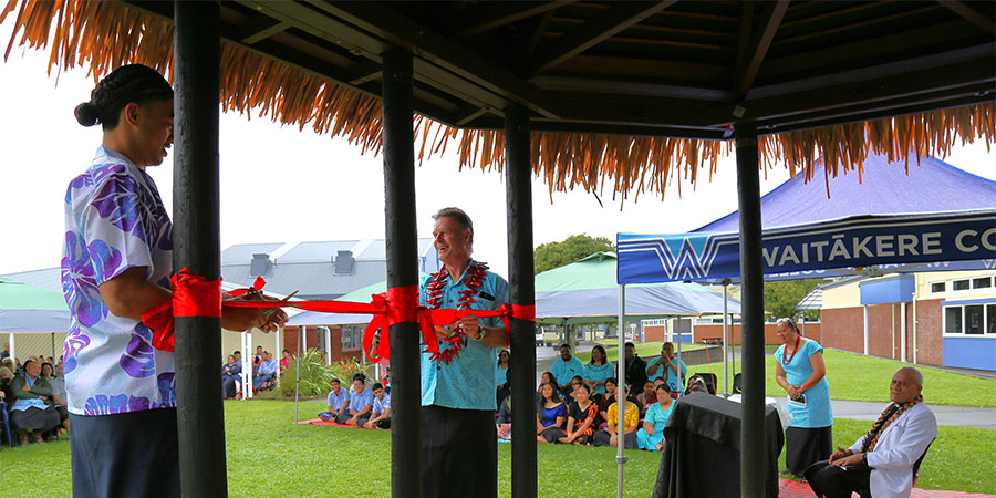 A student and a staff member from Waitākere campus prepare to cut a ribbon to open the new Fale.