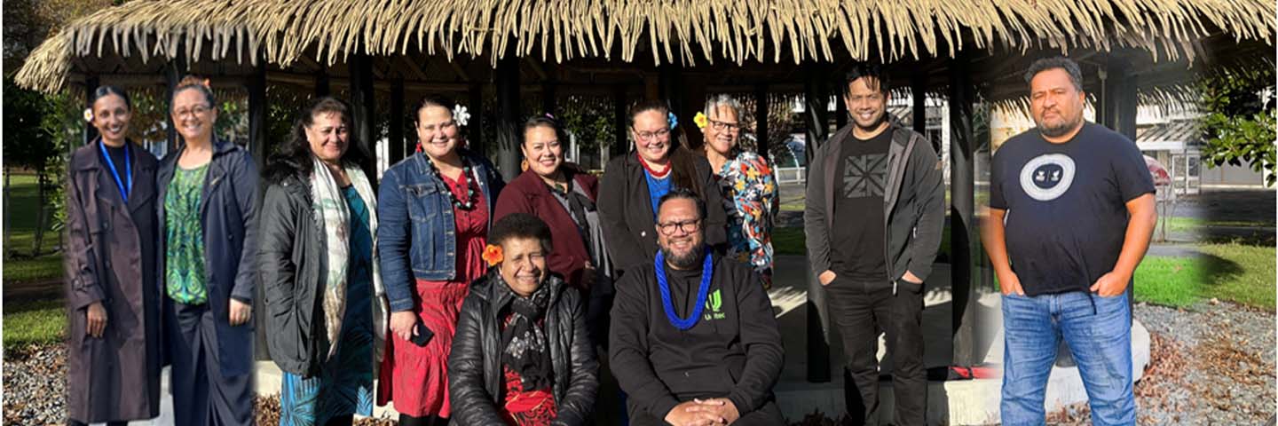 The members of the Pacific Research Fono smile for the camera outside Unitec's fale.