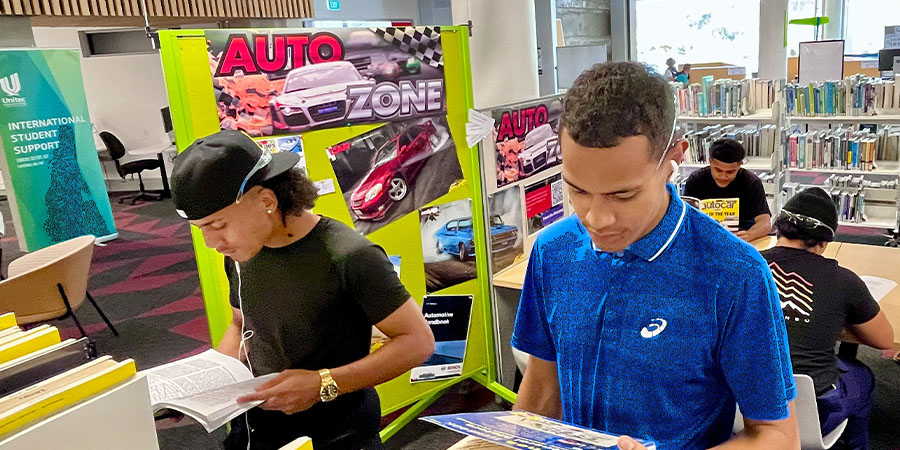 Students spend time in the Auto Zone.