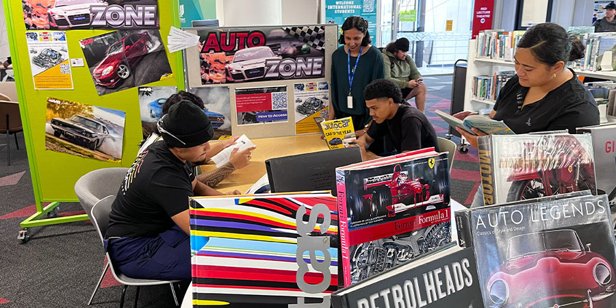 Students spend time in the Auto Zone.