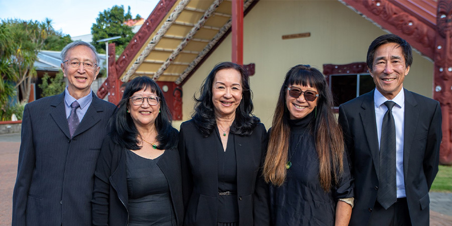 Professor Hong and her family smile for the camera. 