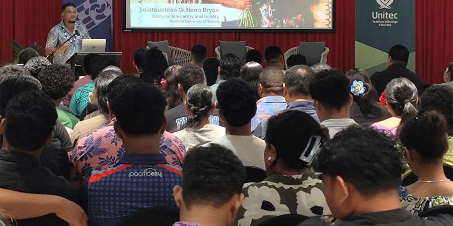 Attendees at the Manaaki Scholarships information session in Samoa listen to a presentation.
