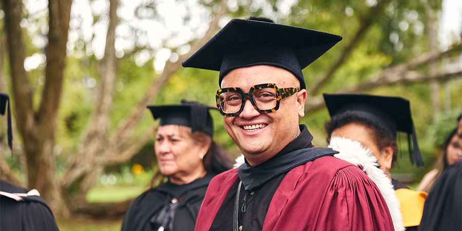 Associate Professor Byron Rangiwai in graduation regalia.