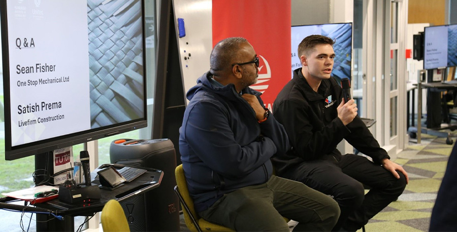 Employers Satish Prema and Sean Fisher speaking at the Q and A session.