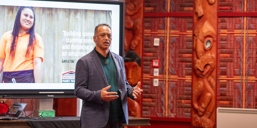 Dr Wiremu Manaia gives a speech inside the marae wharenui.