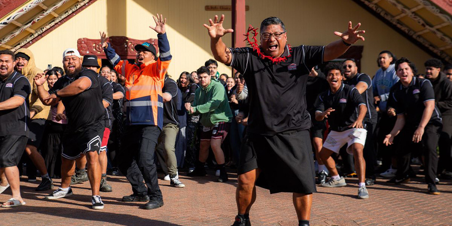 Tu Nuualiitia, Student Experience Partner, performs a haka.