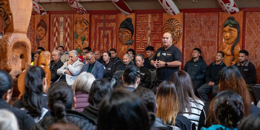 Matua Vince gives a speech to assembled guests in te wharenui o Ngā Kete Wānanga Marae.