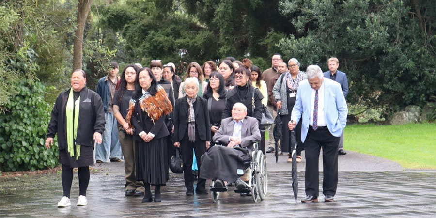 Professor Hong (second from left) with her family and Pae Arahi Hare Paniora (right).
