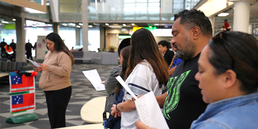 Staff and students joining in a song during Samoa Language Week.