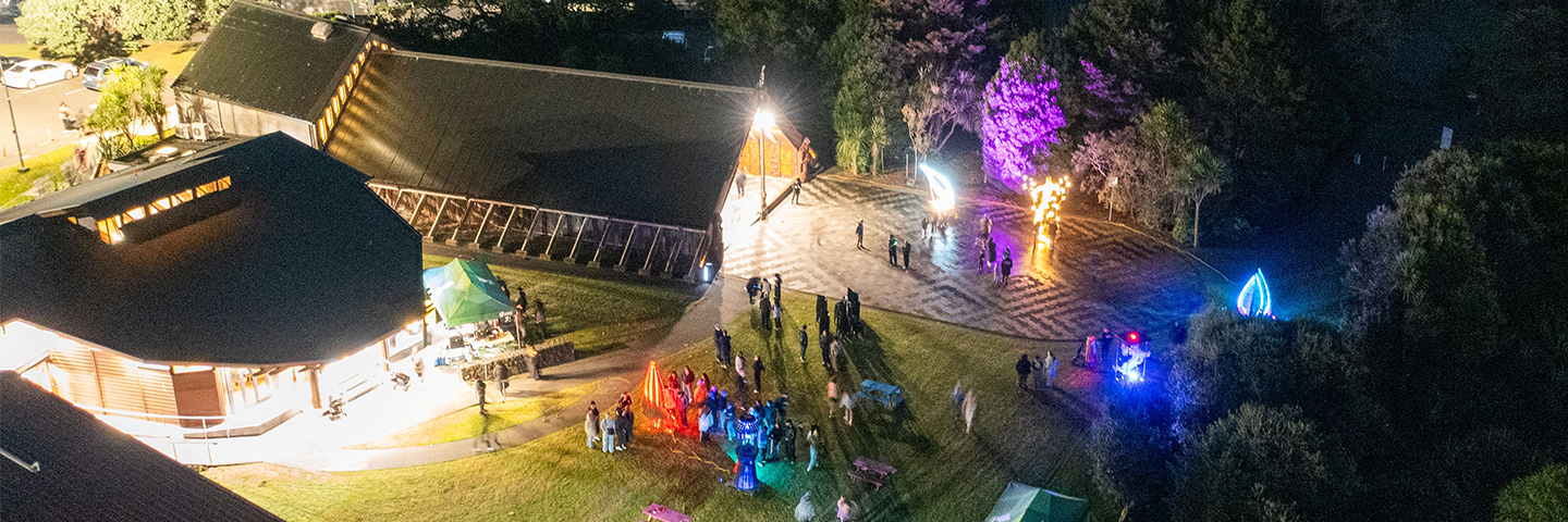 Aerial night view of light sculptures at Unitec Te Noho Kotahitanga marae during Matariki glow trail celebration