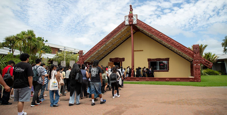 Students enter MIT's marae during their pōwhiri.