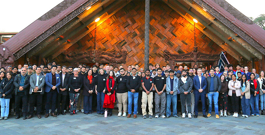 AI Hackathon participants outside Te Noho Kotahitanga Marae.