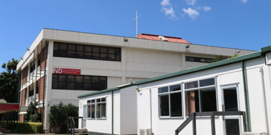 The exterior of the Maritime School in the sunshine.