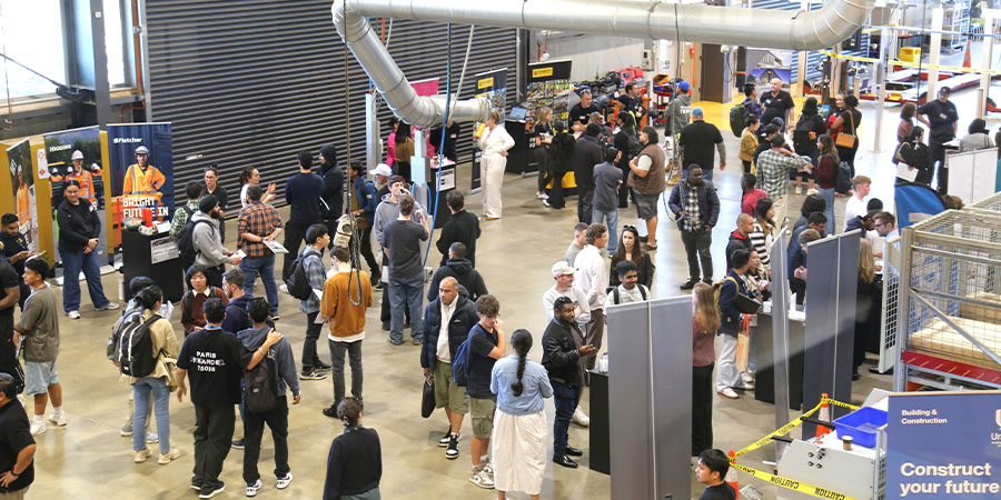 A wide shot taking in the Industry Connect event from high up in the Mataaho building.